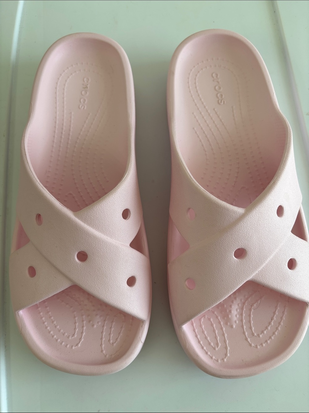 CROCS Women' Croslite Slide Sandals in  Pink
